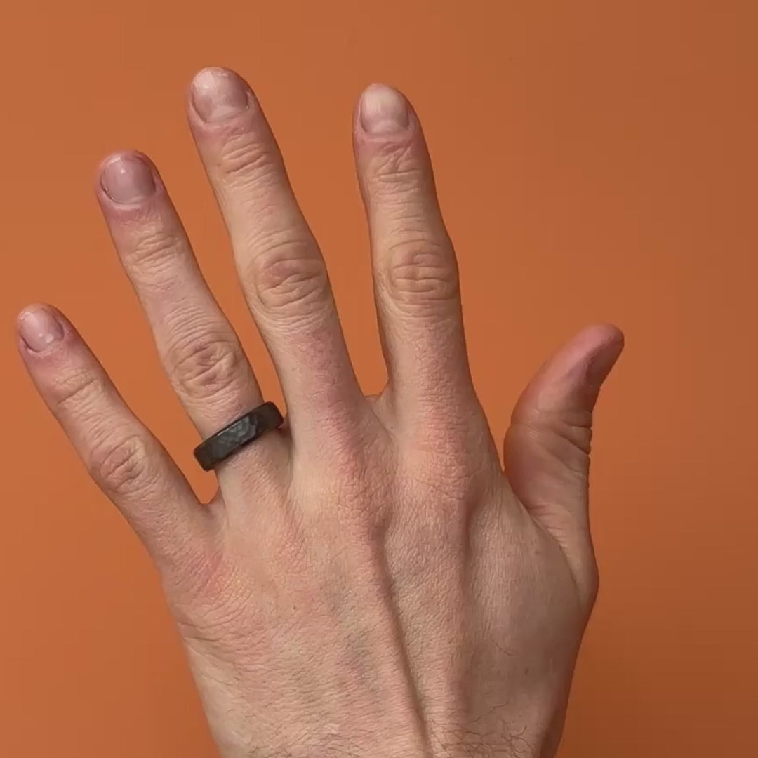 Video of Black Zirconium Hammered 6mm Ring on a hand. By Bound.
