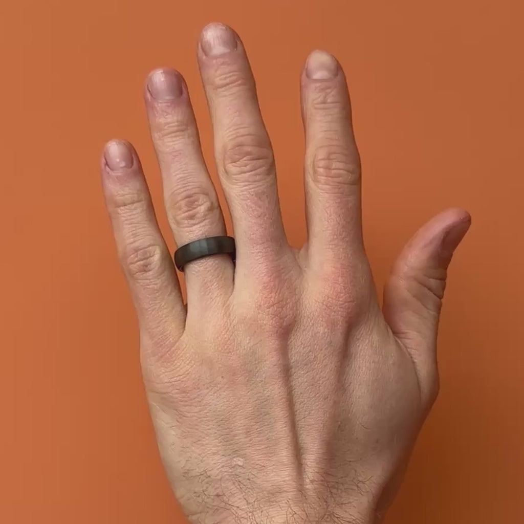 Video of Black Zirconium Brushed 6mm ring on a hand. By Bound.
