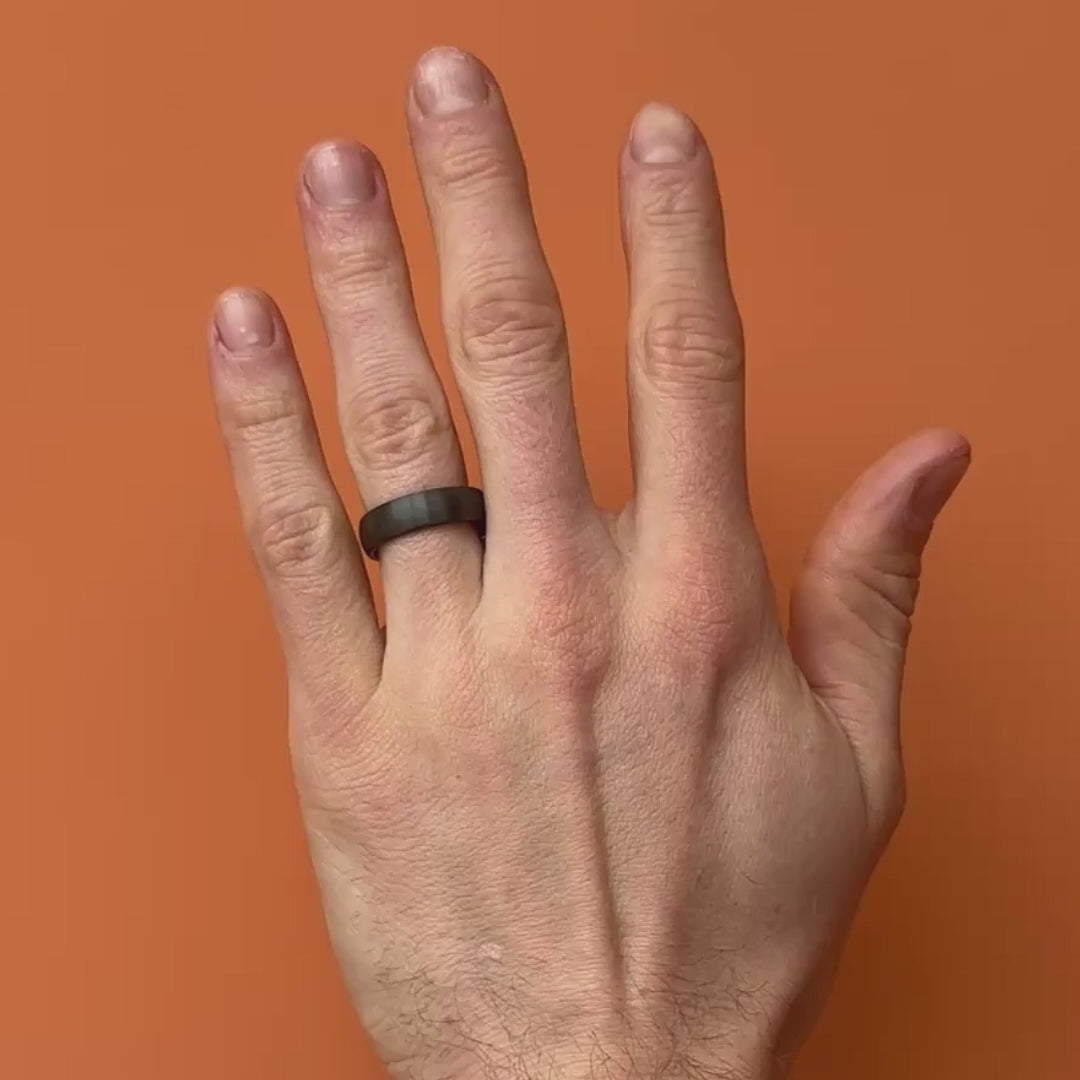 Video of Black Zirconium Brushed 6mm ring on a hand. By Bound.